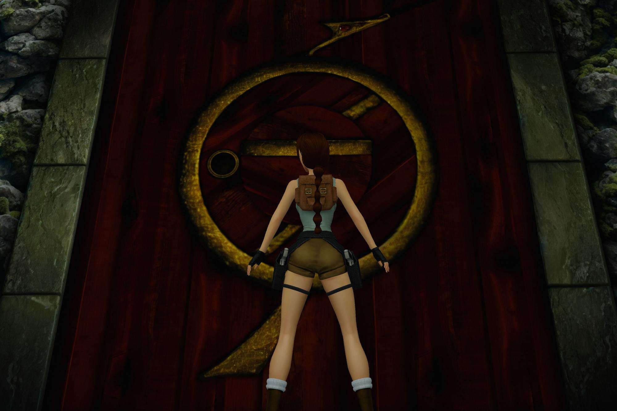 Lara Croft standing in front of the Temple of Xian entrance door