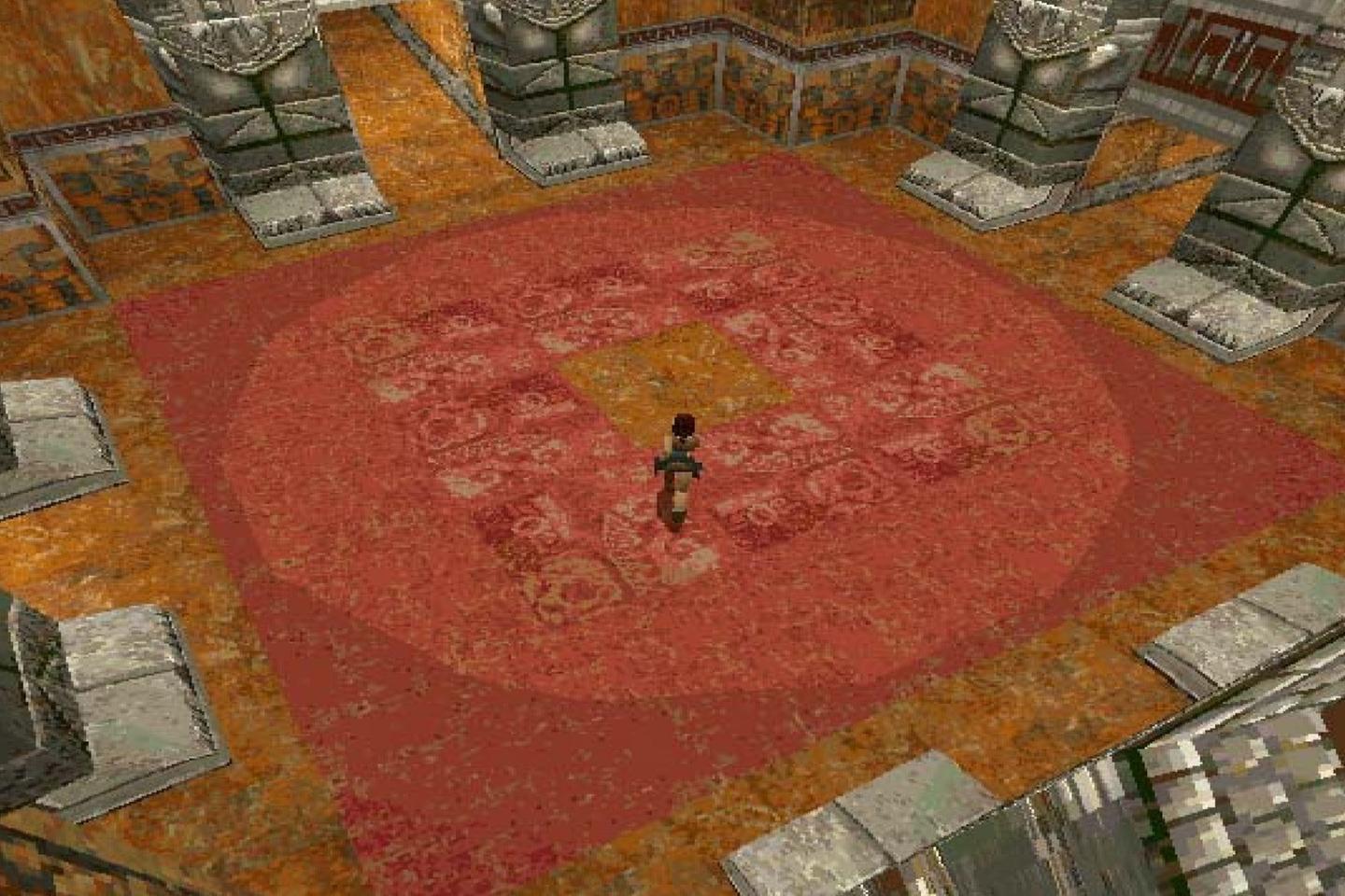 Lara standing in large red circle in middle of tomb