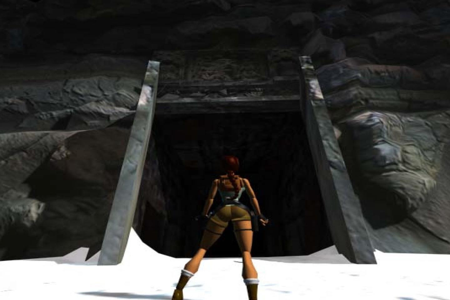 Lara about to enter snowy tomb door