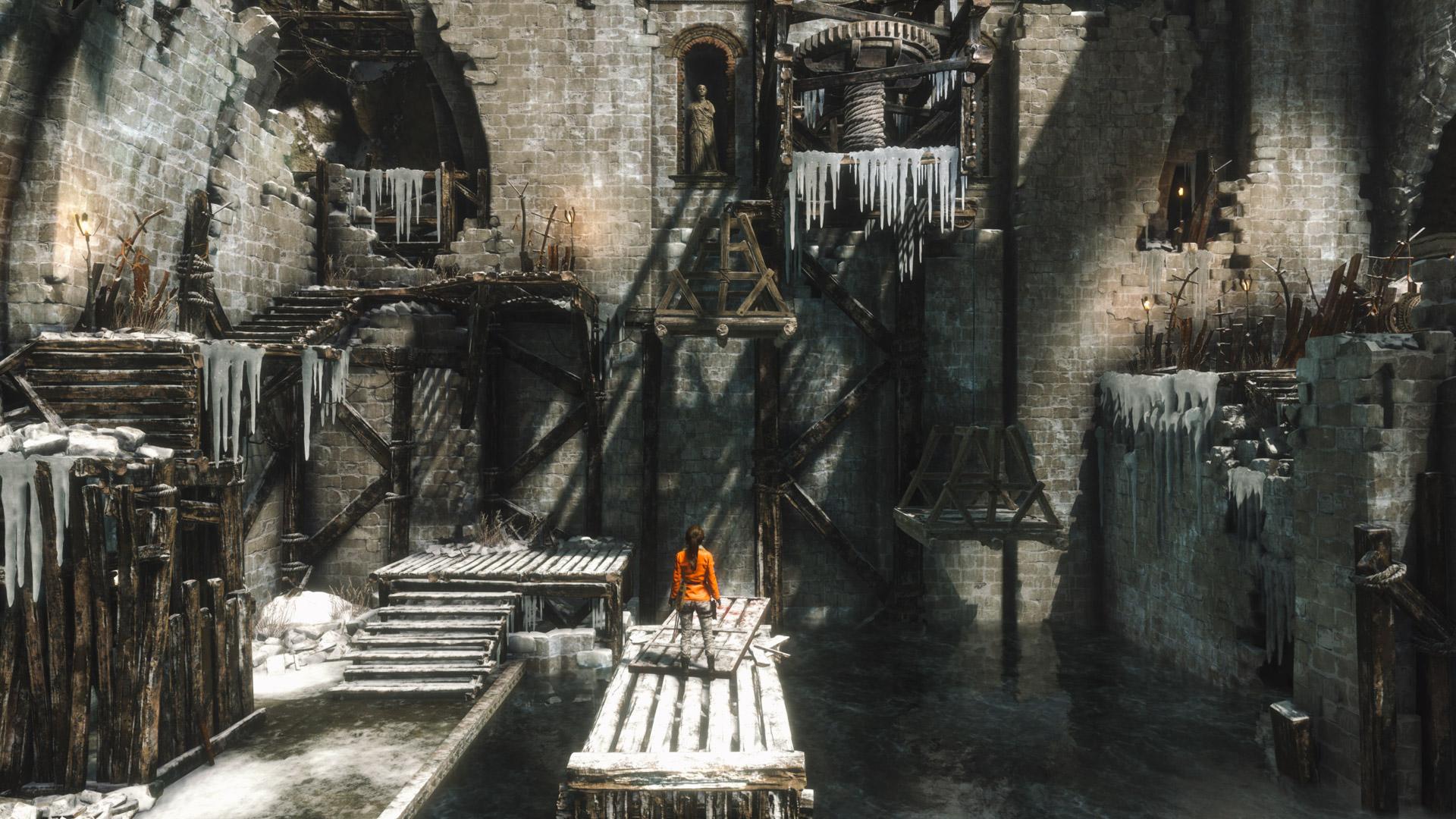 Lara Croft looking at a puzzle of ropes and pulleys in Rise of the Tomb Raider's Baba Yaga DLC.
