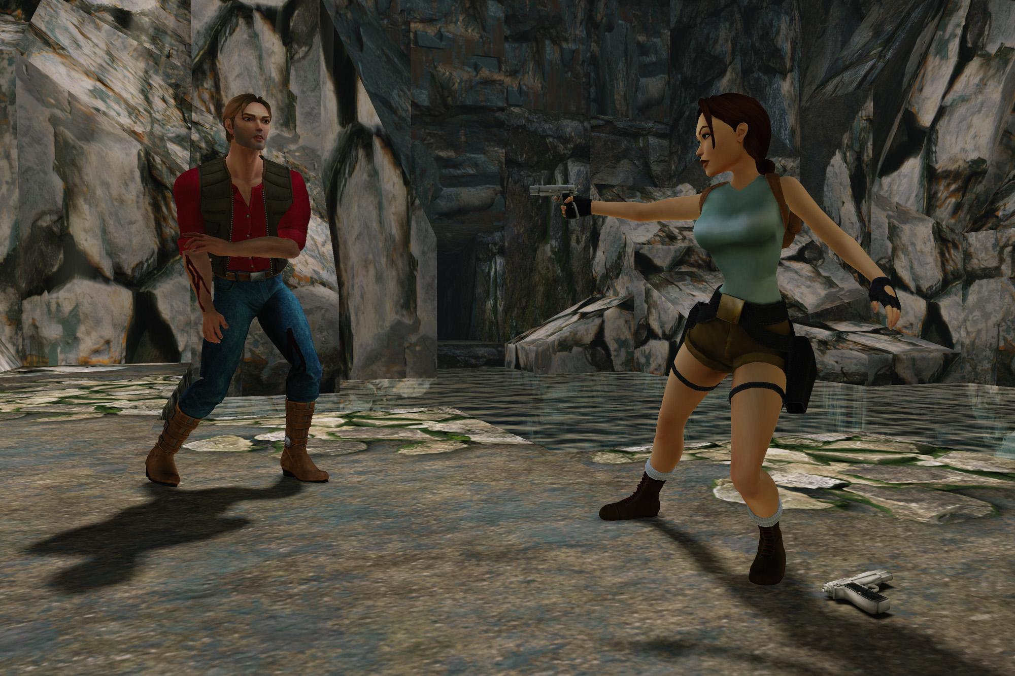 Lara pointing her gun at Larson in the Lost Valley.