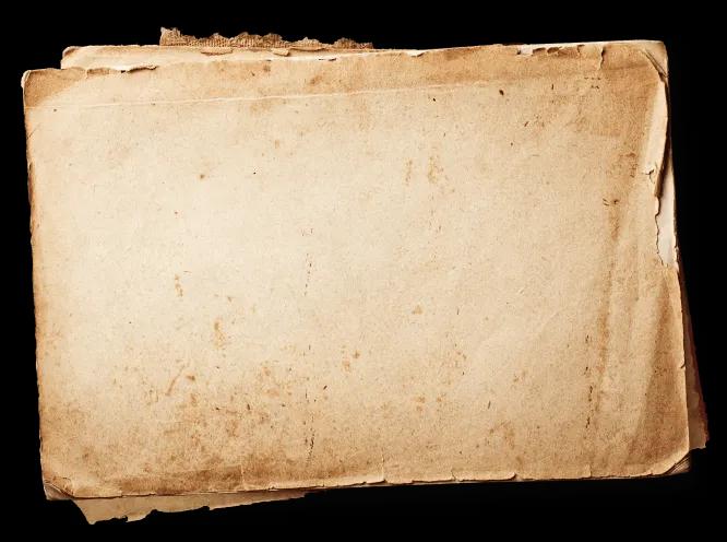 stack of papers beneath the mobile image