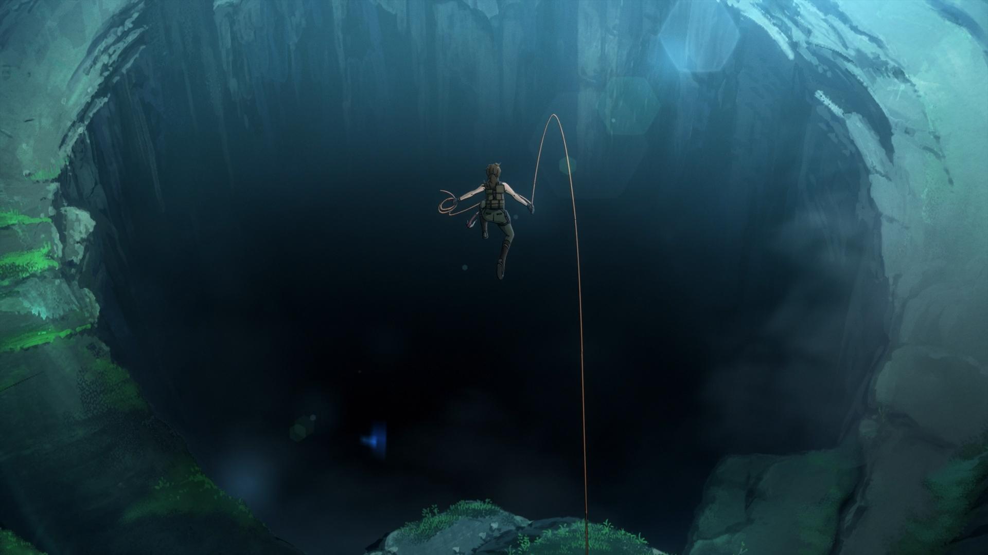 Action scene of Lara Croft rappelling into a vast cavern illuminated by a faint light from above.