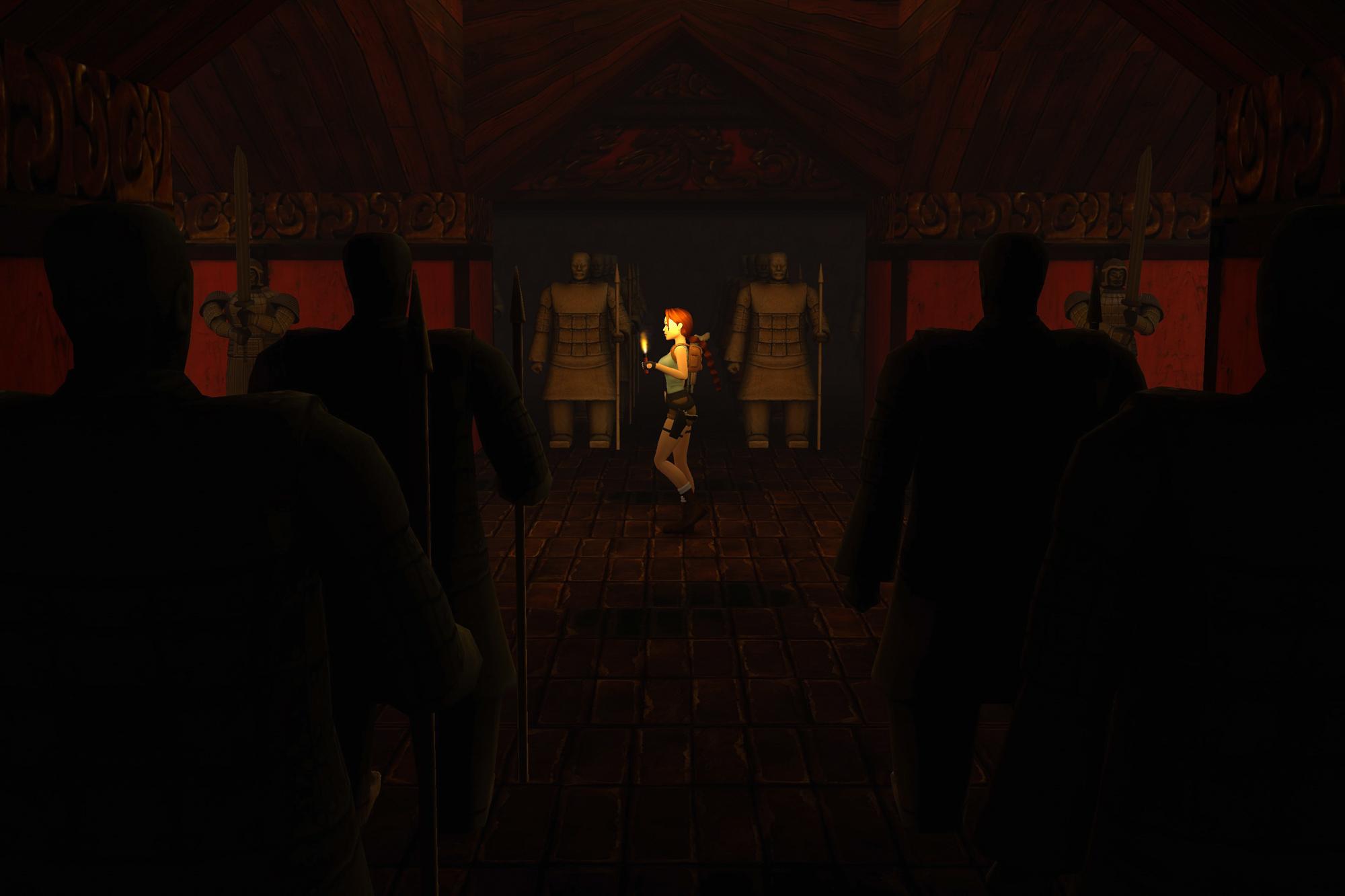 Lara Croft walking with a lit flare in the Temple of Xian.