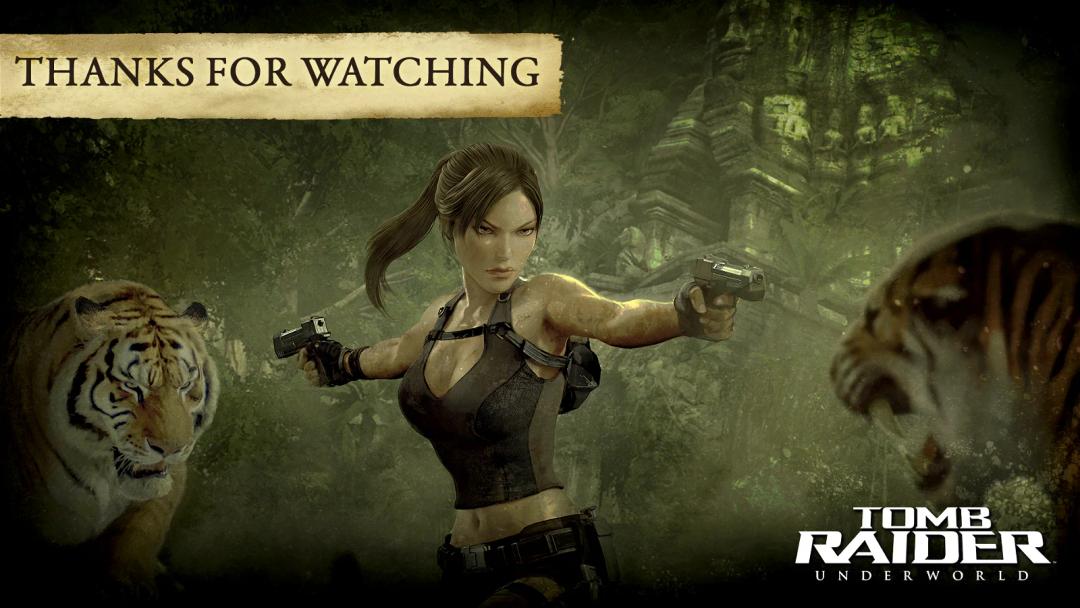 A promotional graphic for the video game "Tomb Raider: Underworld" showing the main character, Lara Croft, with dual pistols confronting two tigers with a "Thanks for Watching" caption.