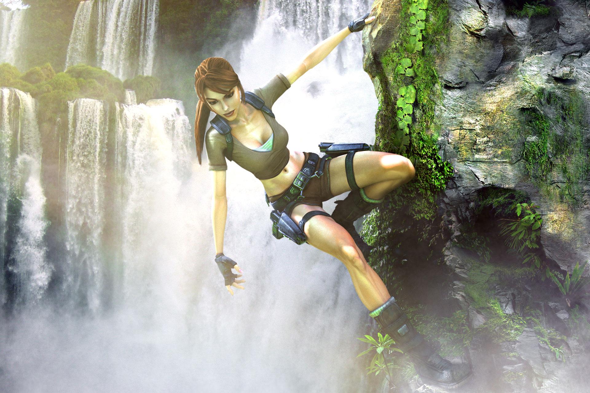 Lara Croft from Tomb Raider: Legend hanging off a cliff in front of a waterfall.