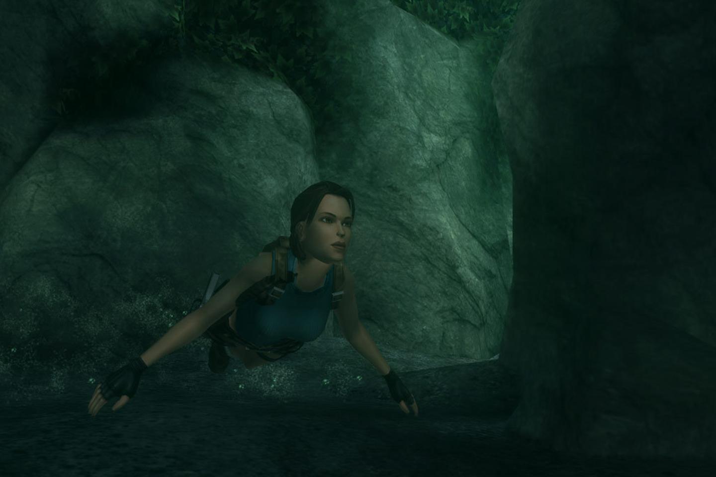 Lara floating through dark tunnel.
