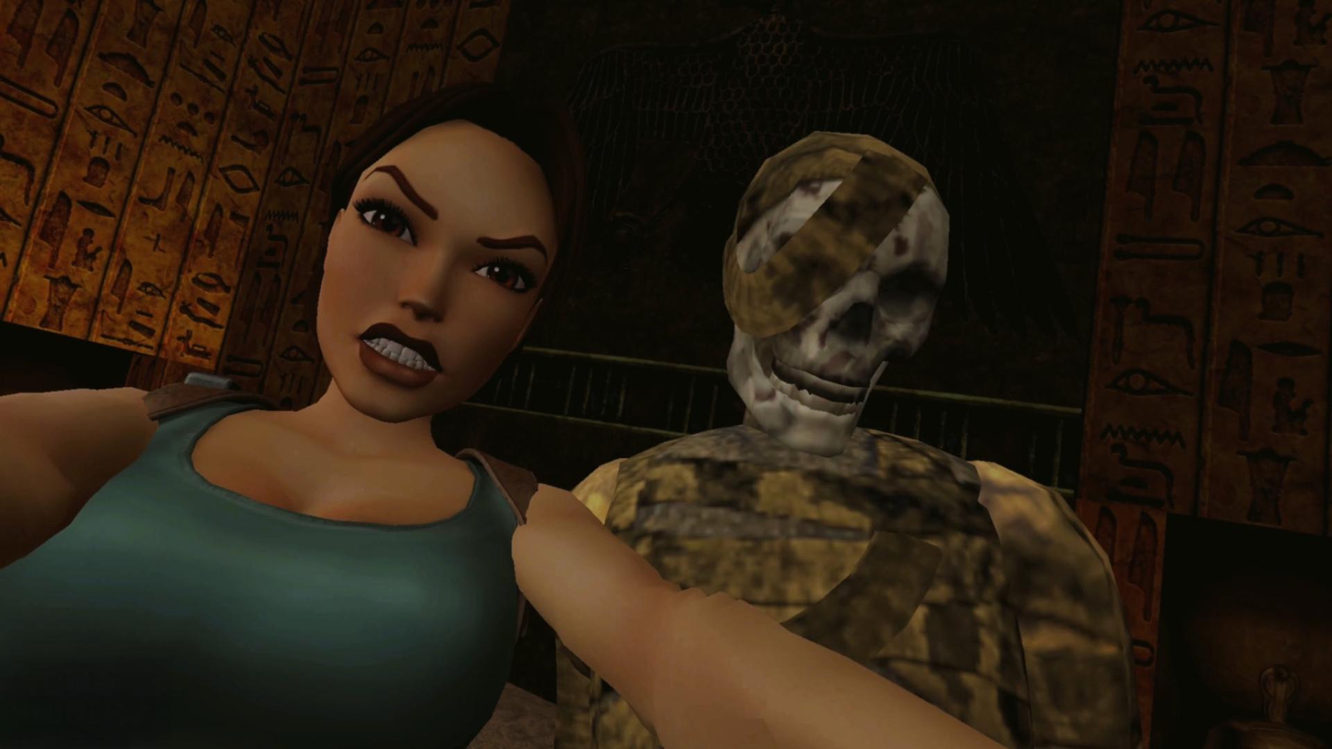 Lara Croft taking a selfie with a mummy.