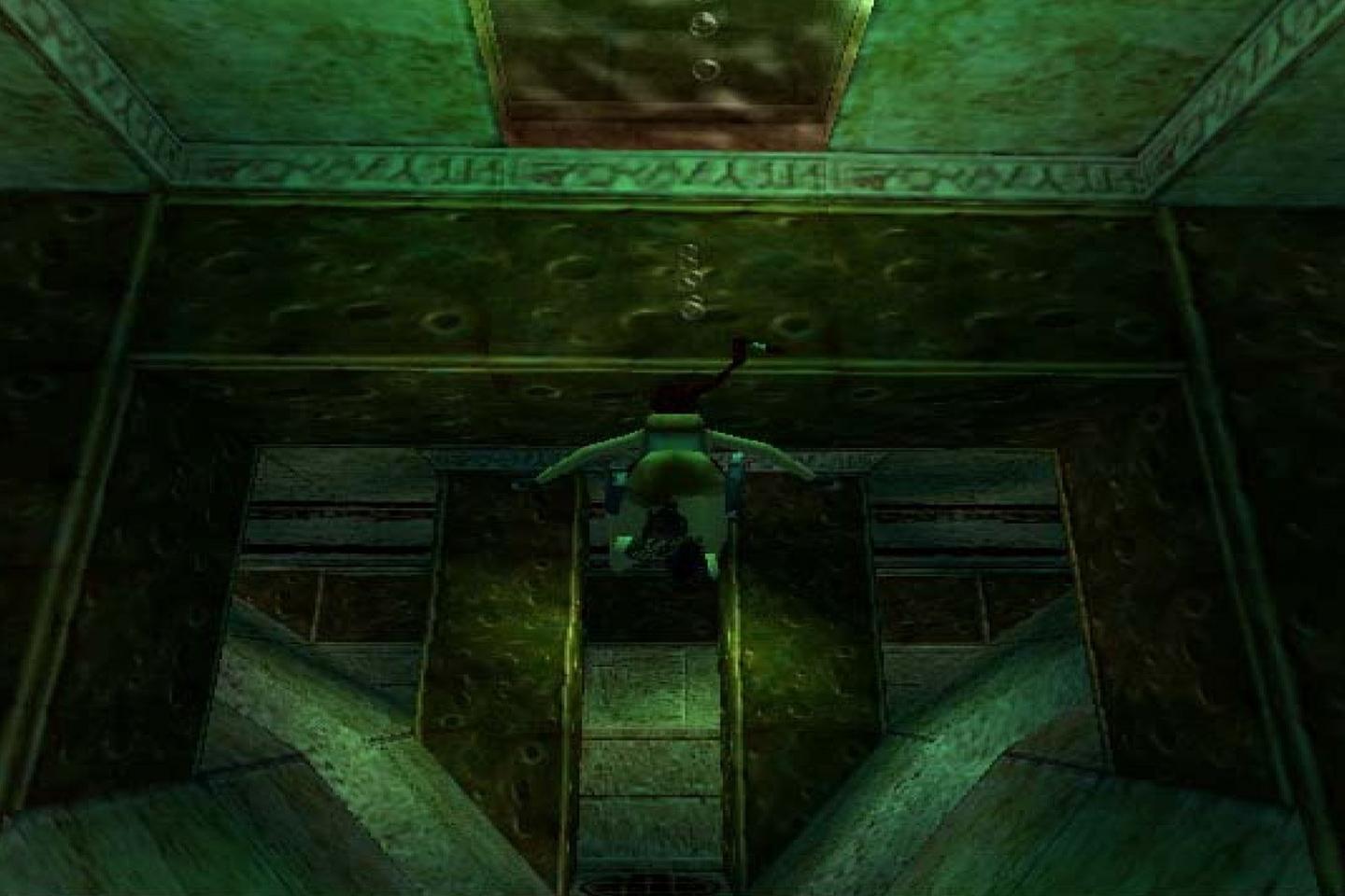 A screenshot from a video game showing a character swimming underwater in a green-lit, submerged room with metallic walls and a small opening at the top.