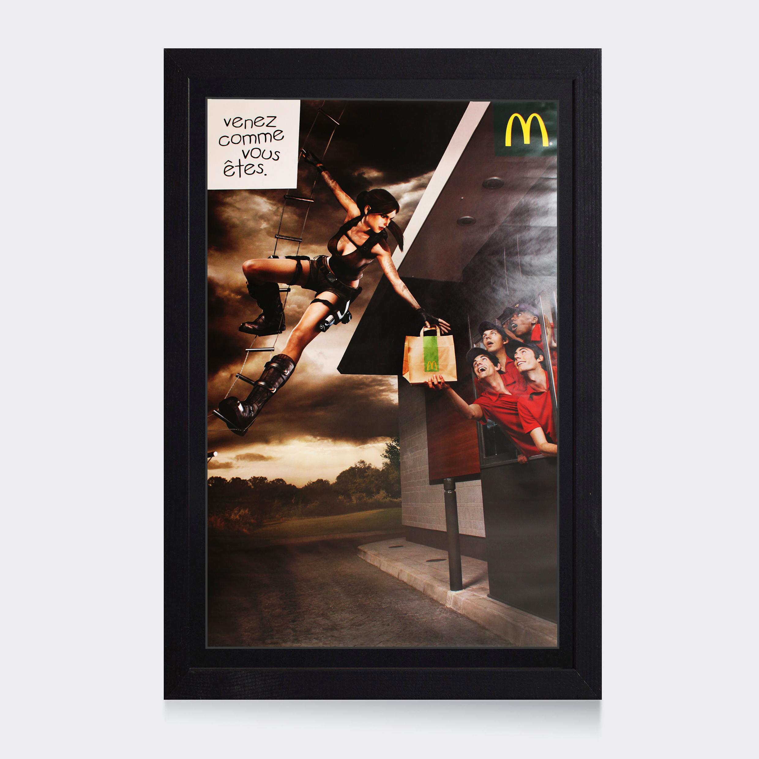 A large format sign of Lara Croft for McDonalds originally on a bus stop.