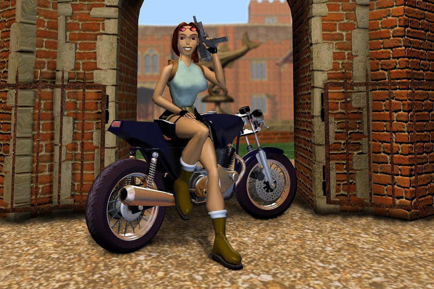 Lara in adventure gear poses on a motorcycle in front of a brick archway, displaying early 3D video game graphics.