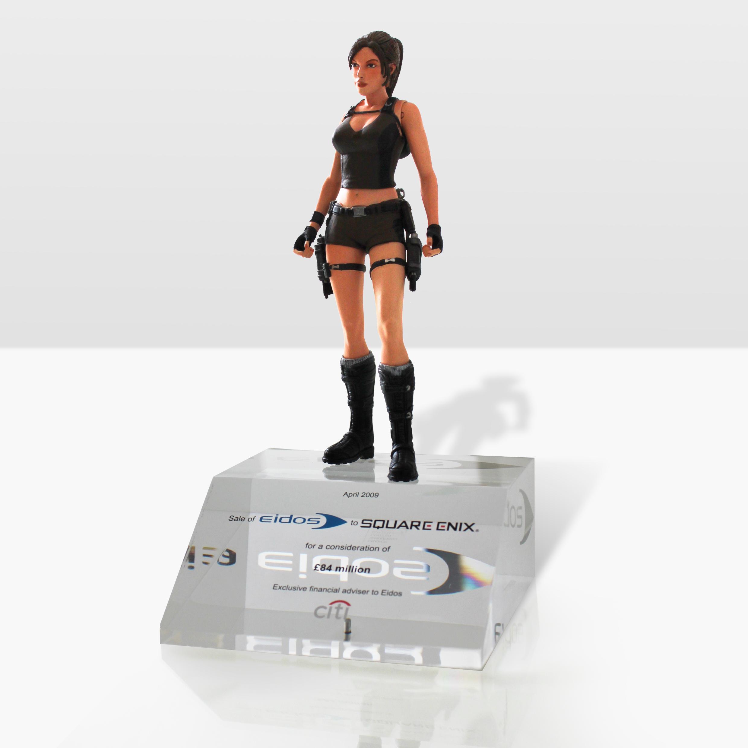 A photograph of a sales statue from Eidos to Square Enix.