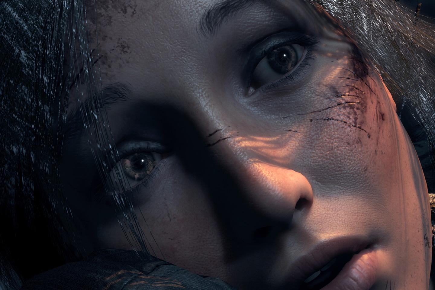 A close-up image of Lara Croft from the Tomb Raider series, showing her intense expression with striking detail in her eyes, amidst dirt and blood on her face.