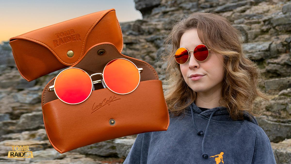 Official product image of Lara Croft's classic red, circular glasses.